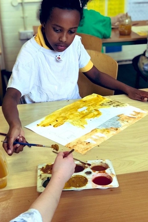 Reay Primary school - children paint using Indian spices 